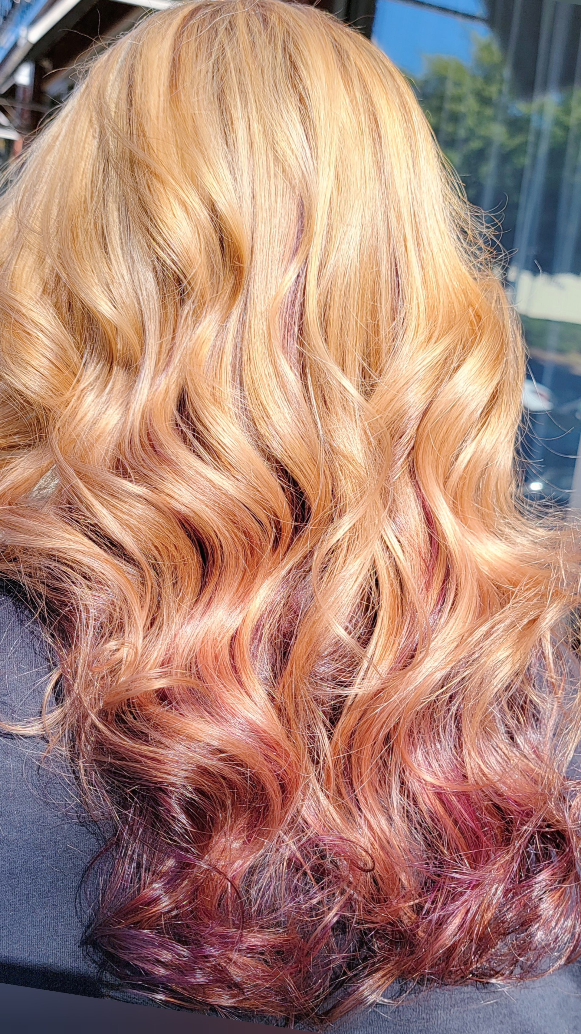 Copper blonde waves fading to burgundy ends
